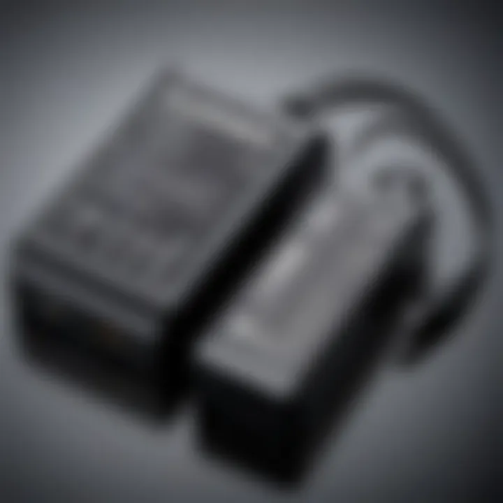 Close-up of a Lumix battery alongside a charger