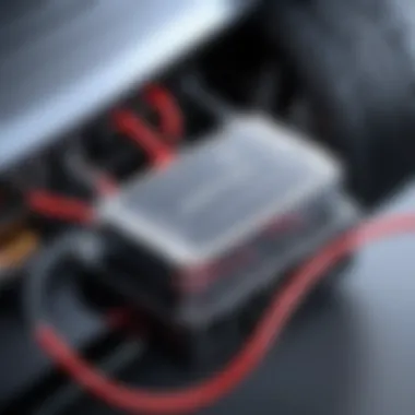 Efficient Connection of Battery Jumper to Vehicle Battery jumper connected to a vehicle
