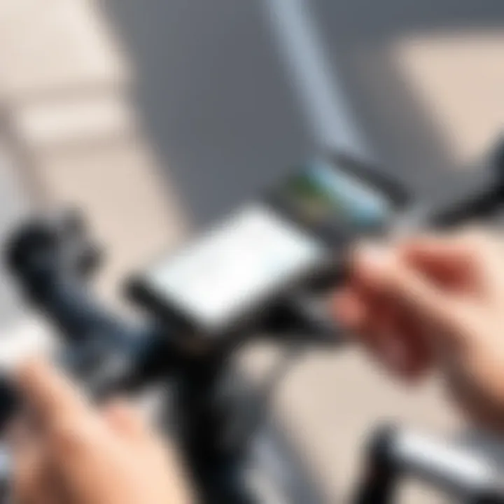 A cyclist adjusting a phone holder on the handlebars