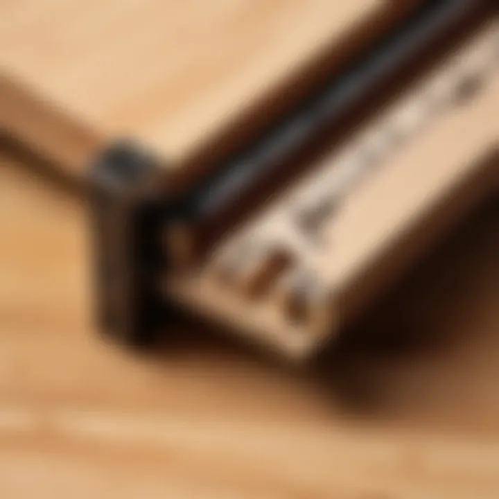 Different types of wood bed frame connectors displayed on a wooden surface