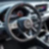 Close-up of a sleek steering wheel computer holder showcasing innovative design.