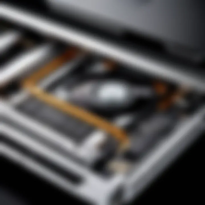 A close-up view of a MacBook Pro's optical drive mechanism
