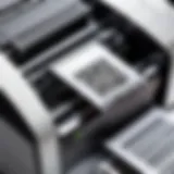 Close-up of a barcode card printer showcasing its intricate components