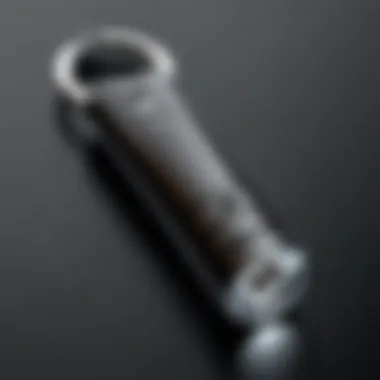 An individual using a penlight keychain for personal safety.